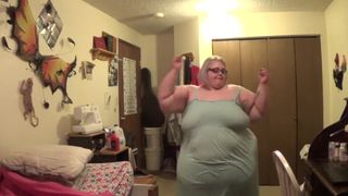 Ssbbw struts and shows belly - 1 image