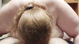 Big Busty Redhead Blows Husband to Climax