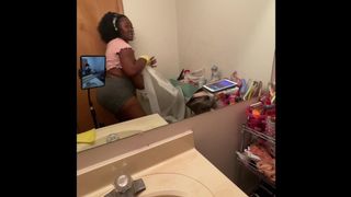 Ebony BBW Cleaning Nipples Hanging out my Shirt - 1 image