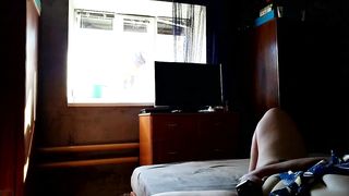 Milf fucks herself for window cleaner