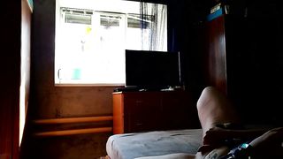 Milf fucks herself for window cleaner