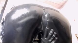 Shining My New Catsuit - Princess Dandy shines her black latex rubber catsuit - 1 image
