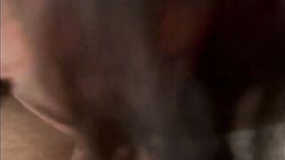 On her knees, taking it down her throat  and swallow. - 3 image