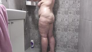 A hidden camera in the shower room spies on a mature wife with a plump figure and big tits and a fat booty Homemade fetish - 6 image