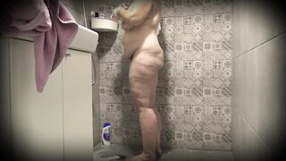 Mature busty fat MILF takes a shower. - 5 image