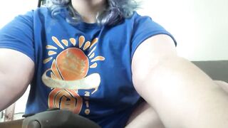 Milf Using hitachi while playing video games