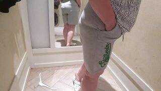 Hidden camera in the fitting room spying on a mature PAWG. Chubby milf with big booty in panties tries on different shorts. Amateur fetish and close-ups. - 12 image