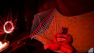 Getting frisky in a tent fingering her wet hole in a hammock - 11 image