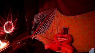 Getting frisky in a tent fingering her wet hole in a hammock - 12 image