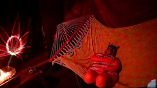 Getting frisky in a tent fingering her wet hole in a hammock - 3 image