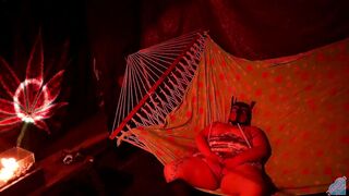 Getting frisky in a tent fingering her wet hole in a hammock - 9 image