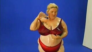 Nasty fatso lady is fond of getting her ungraspable  body oiled and her cunt drilled with toy by curious dude - 3 image