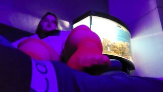 Neon footjob from a hottie in red pantyhose - 2 image