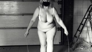 Jumping over a rope. Mature BBW MILF shaking big tits. - 11 image