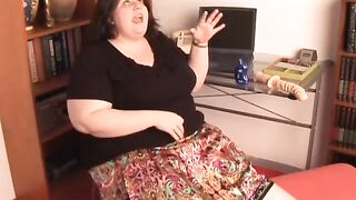 Beautiful BBW brunette talks dirty and gets her tits out - 9 image