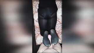 A curvy beauty in black tights jerks off my dick with her legs. Footjob in opaque pantyhose. - 11 image