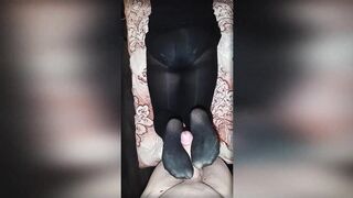 A curvy beauty in black tights jerks off my dick with her legs. Footjob in opaque pantyhose. - 13 image