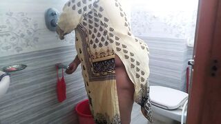 Indian desi stepmom gets Horny & sex with water pipe in washroom. Then stepson fucked her & Huge cum behind - Hot MILF - 1 image