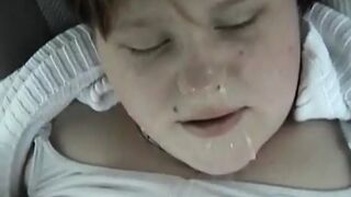 A chubby German lady enjoys sucking a hard cock in the back of the car - 1 image