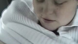 A chubby German lady enjoys sucking a hard cock in the back of the car