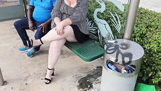 I lifted my mini skirt and opened my legs for a stranger at the bus stop to rub my pussy through my panty