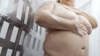 Naked stepmom with big tits and ass takes a shower - 11 image