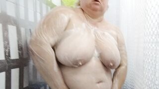 Naked stepmom with big tits and ass takes a shower - 12 image