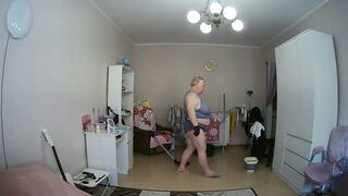 mother-in-law cleans the room naked