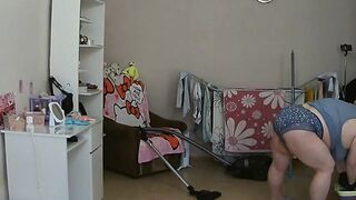 I spied on my mother-in-law and watched her vacuuming naked