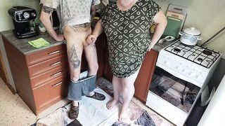 a fat woman jerks off my dick in the kitchen and I cum powerfully - 1 image