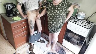 a fat woman jerks off my dick in the kitchen and I cum powerfully