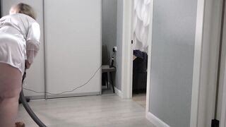 A home camera watches a mature housewife with a thick butt under a short robe and big tits. Chubby MILF behind the scenes. PAWG. - 12 image