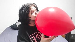 Clown girl Blowing up and popping huge balloon - 4 image