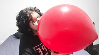 Clown girl Blowing up and popping huge balloon - 5 image
