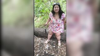 Pussy shown and masturbates under the dress in the park - 15 image