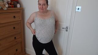 Wife Undressing in the Bedroom in Leggings