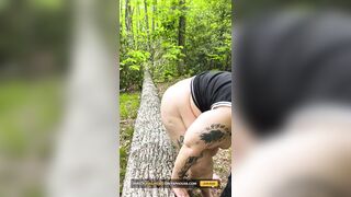 Sucking on a Straw in the Woods Squirting on Tree on Her Knees