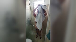 Chubby babe with perfect tits takes a hot shower after gym session