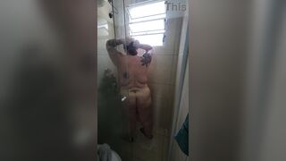 Chubby babe with perfect tits takes a hot shower after gym session