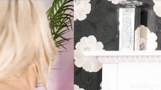 Curvy blonde Mature strips and toys her pussy on the couch