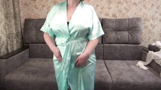Watch this curvy MILF transform into a hot housewife in hot lingerie for a steamy solo date - 1 image
